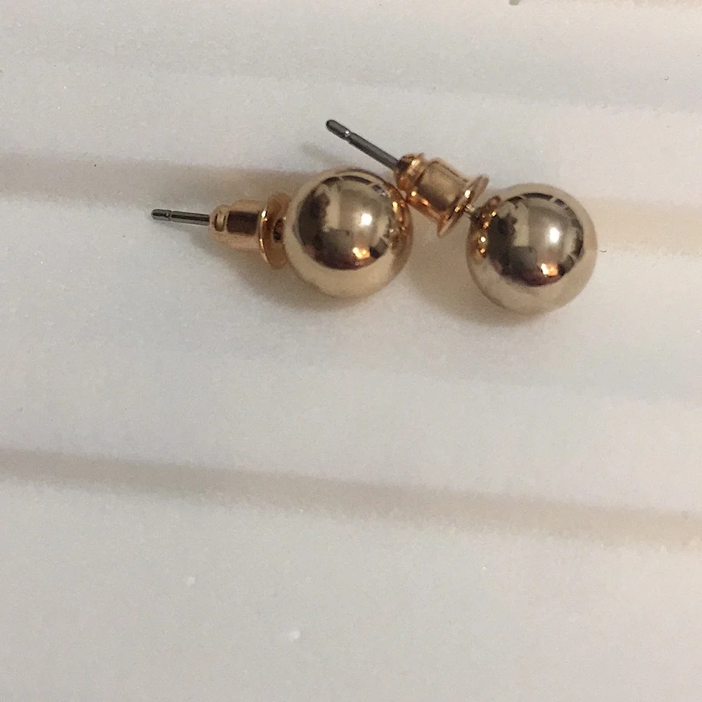 Gold button earrings